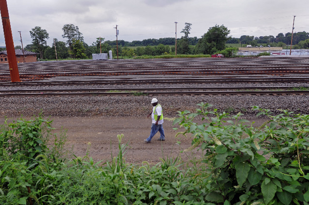 Full steam on rail yard  